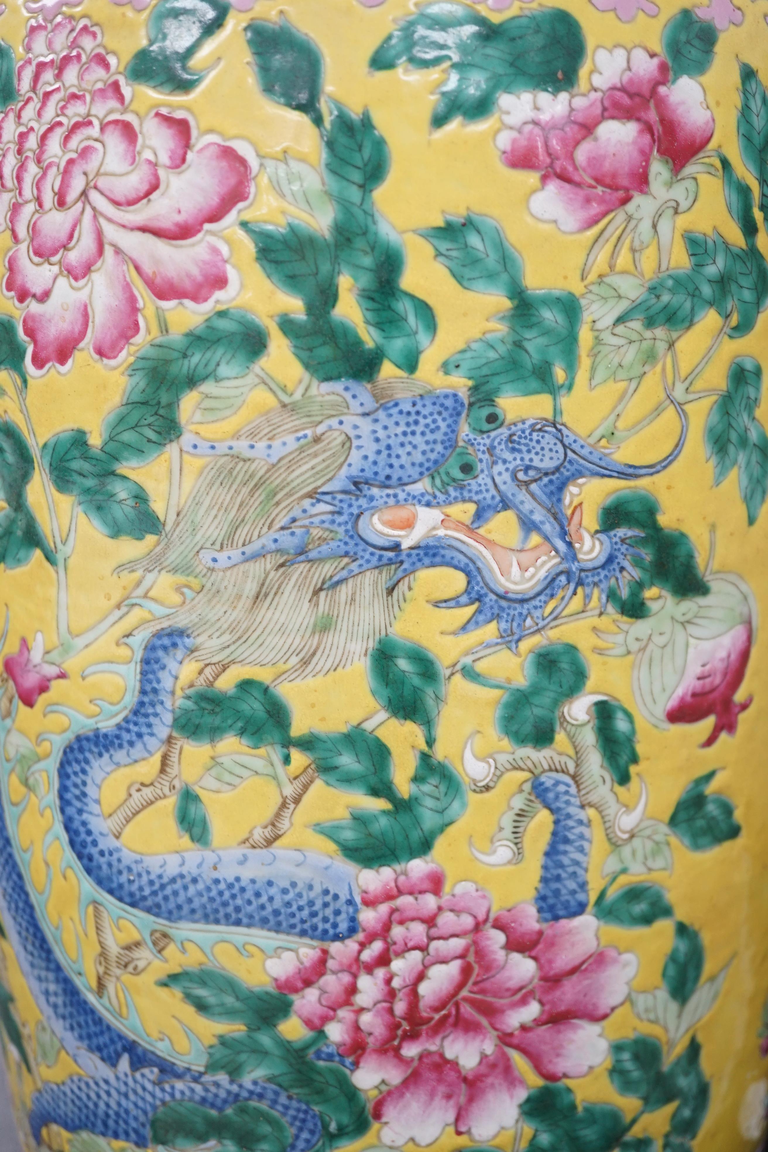 A tall Chinese Straits yellow ground ‘dragon’ vase, 19th century, rim chips
